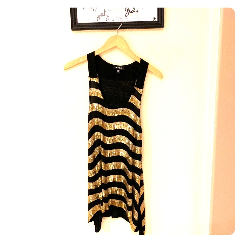 bebe Gold sequin razorback tunic top. 🌟